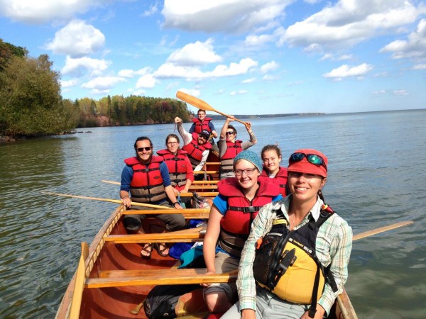 Professor Elizabeth Andre, Dash, and fellow "Fall Block" OED students paddling Lake Superior in the 36' Montreal canoe